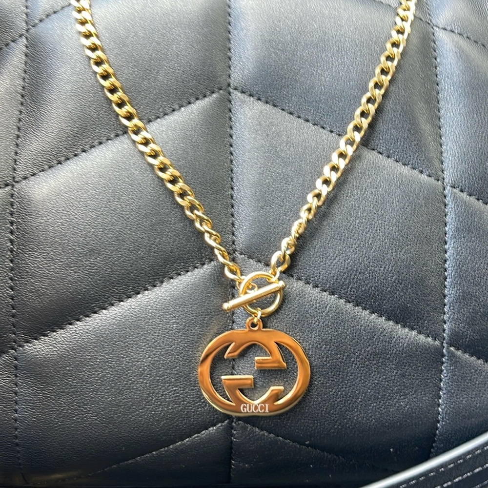 Gucci Gold Necklace with Logo Pendant